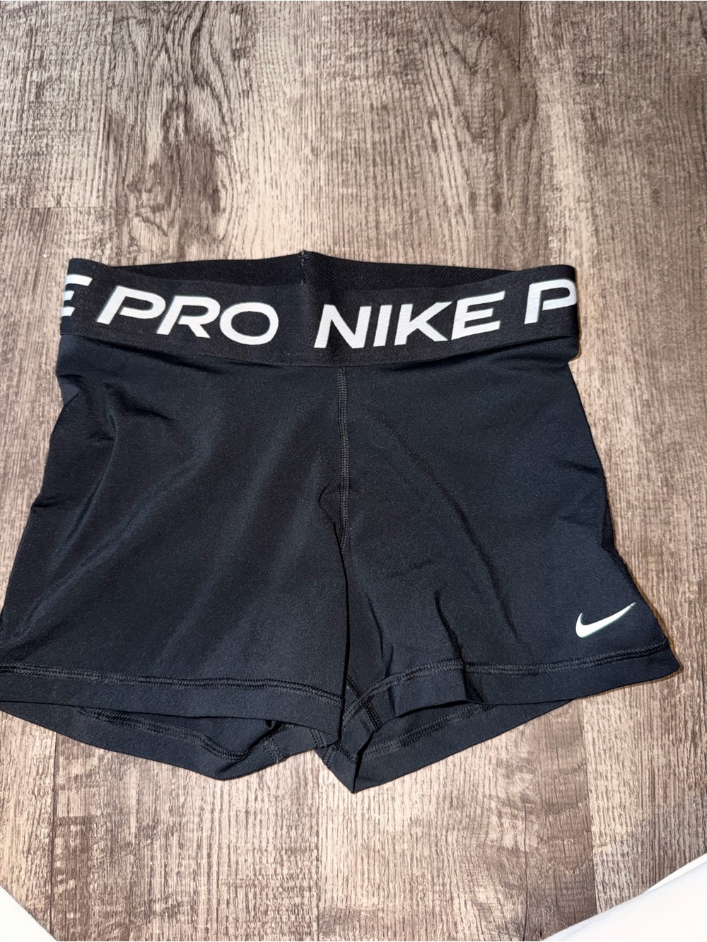 Nike Black Pro High-Rise Athletic Shorts with White Swoosh